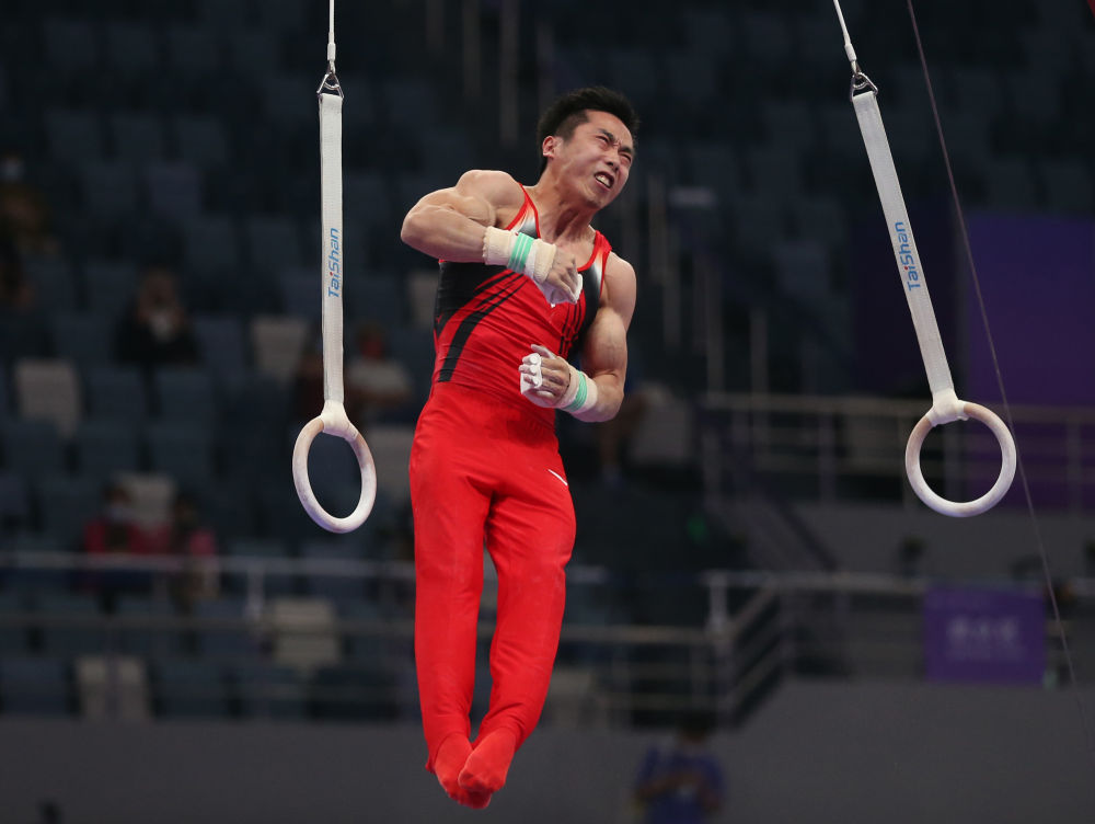 全国体操锦标赛男子吊环决赛瞬间展现力量之美