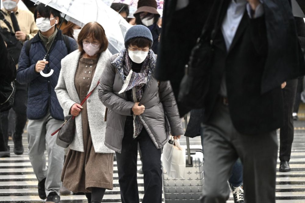 日本东京政府鼓励民众穿高领毛衣:御寒又节能