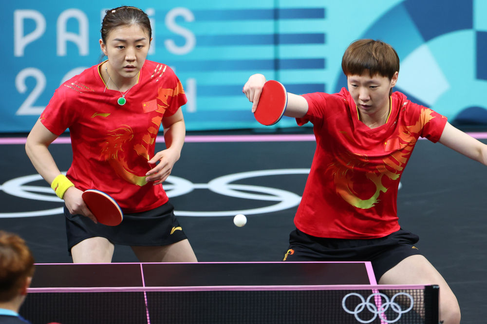 乒乓球男、女团体中国队晋级四强