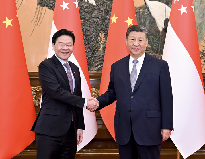 习近平正在与新加坡总理黄Xuncai会面