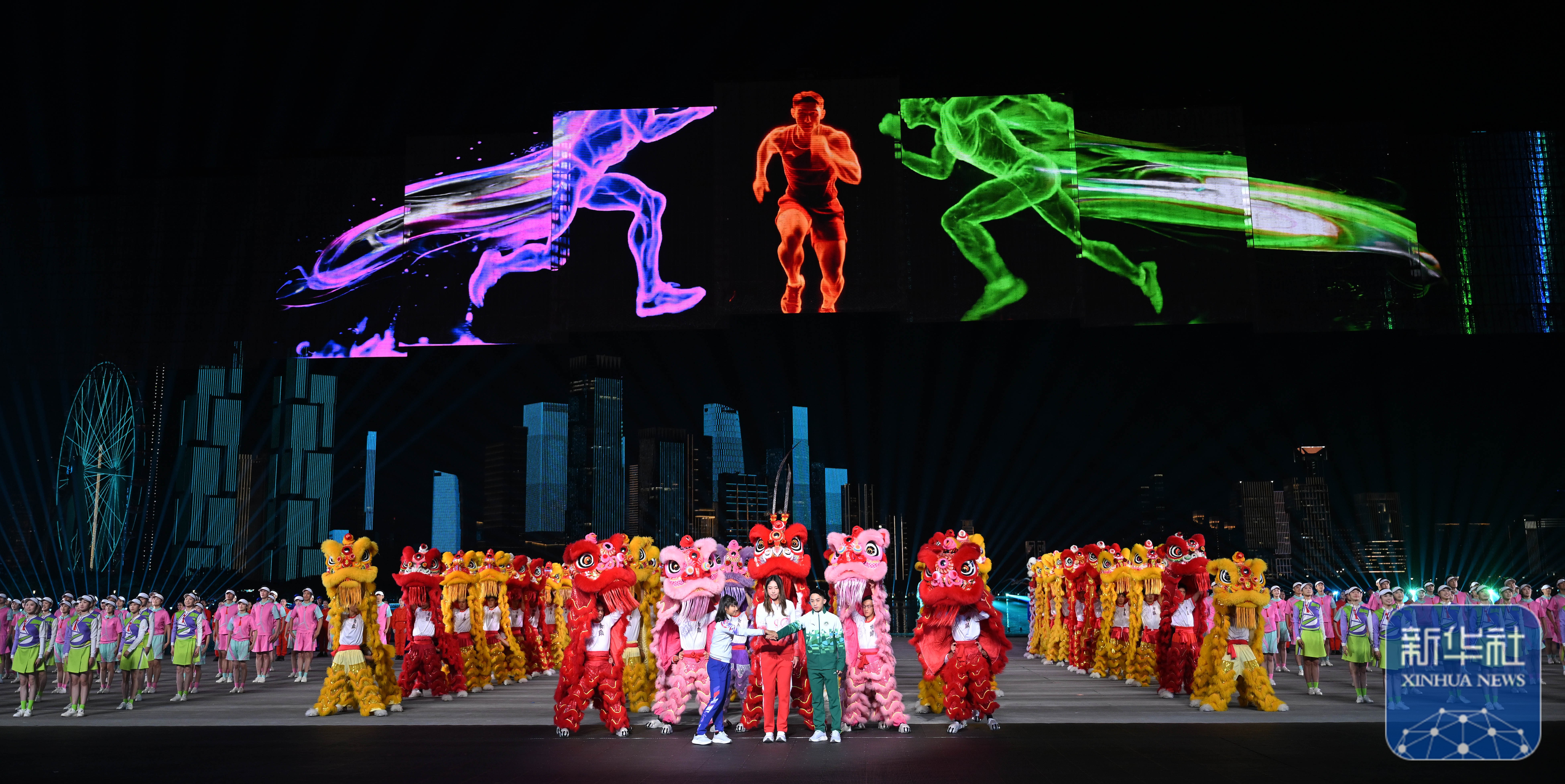 ↑ 广东队运动员王欣瑜（前中）、 新华社记者 夏一方 摄